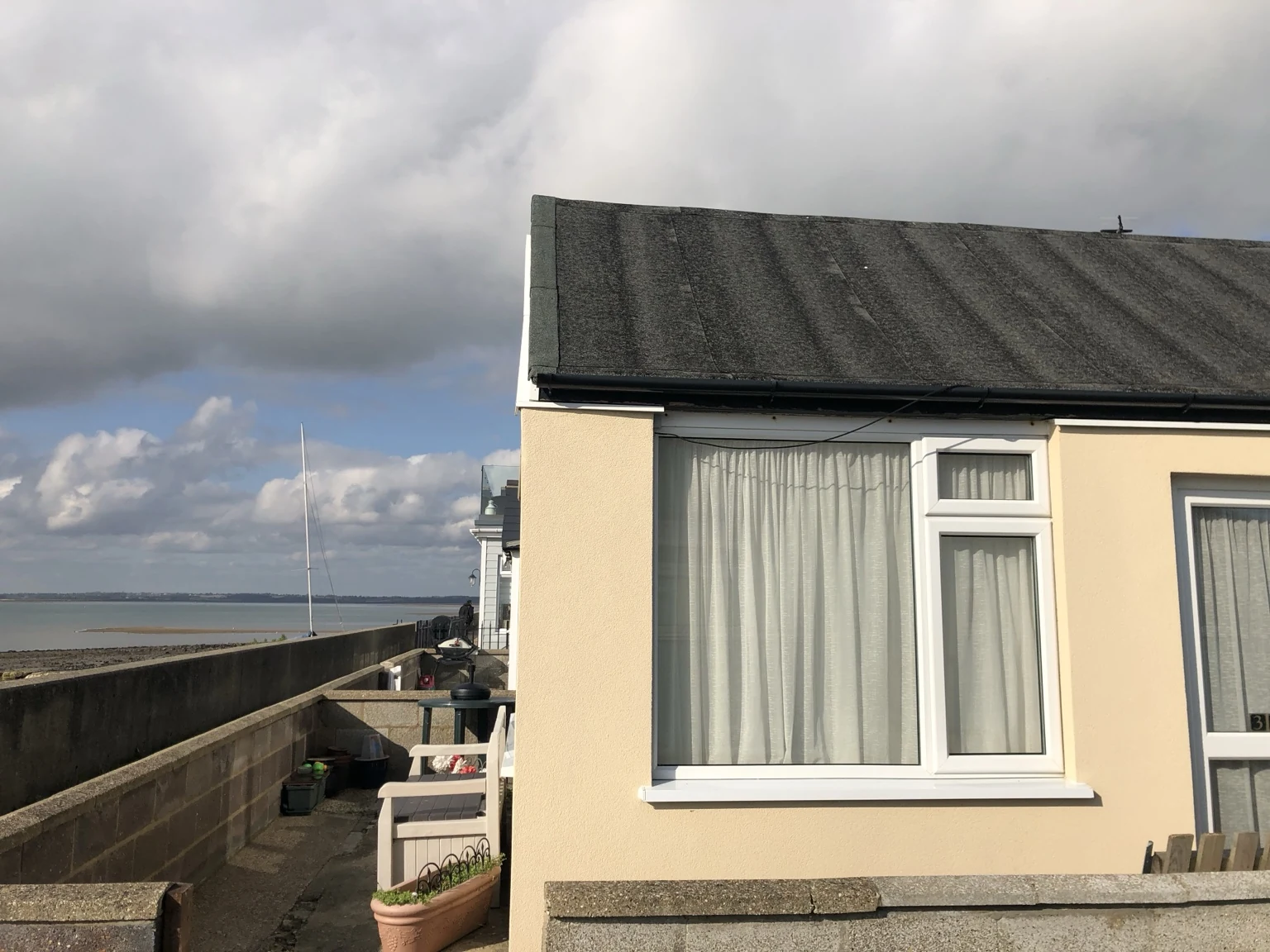 Rendered exterior and window details on a coastal property
